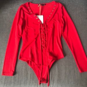 Long sleeved tie front bodysuit